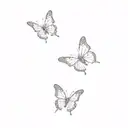 a group of pink butterflies tattoo design idea