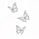 a group of pink butterflies tattoo design idea