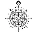 simple compass cross with arrow pointing North with small lotus flower in bottom right hand corner tattoo design idea