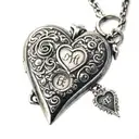A heart-shaped locket with each family member's initials engraved on it tattoo design idea