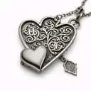 A heart-shaped locket with each family member's initials engraved on it tattoo design idea