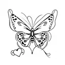 A minimalist tattoo of a heart-shaped butterfly tattoo design idea
