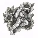 astronaut falling into flower tattoo design idea