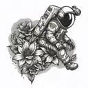 astronaut falling into flower tattoo design idea