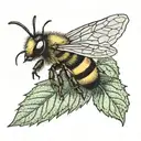 hazel leaf with a little bee on it tattoo design idea