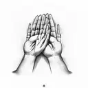 praying hands with the name Roberto written on it tattoo design idea