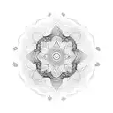 A reggae-inspired mandala with intricate floral patterns tattoo design idea