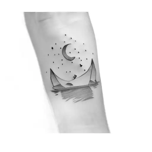 a paper boat tattoo design idea