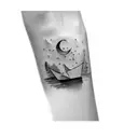 a paper boat tattoo design idea
