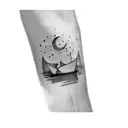 a paper boat tattoo design idea