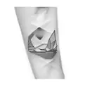 a paper boat tattoo design idea