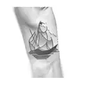 a paper boat tattoo design idea