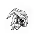 Side profile outstretched hand holding an intense staring eyeball tattoo design idea