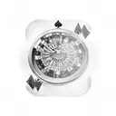 A roulette table surrounded by playing cards tattoo design idea