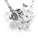 A black and grey sketch of a lawnmower surrounded by flowers and butterflies tattoo design idea