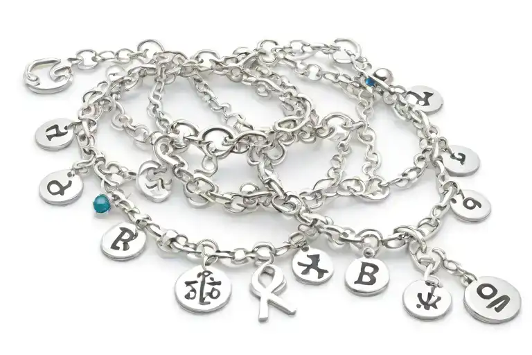 ankle bracelet charms and initials  tattoo design idea