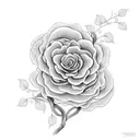 An intricate black and grey design showcasing a blooming flower vine intertwined with a winding road tattoo design idea
