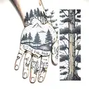 A dotwork tattoo of a forest landscape with a hidden message spelled out on the client's knuckles using trees as letters tattoo design idea