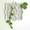 crochet granny square shape and integrate plants tattoo design idea