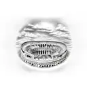 A Roman colosseum with music notes floating in the air tattoo design idea