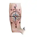 a compass and a clock half half tattoo design idea