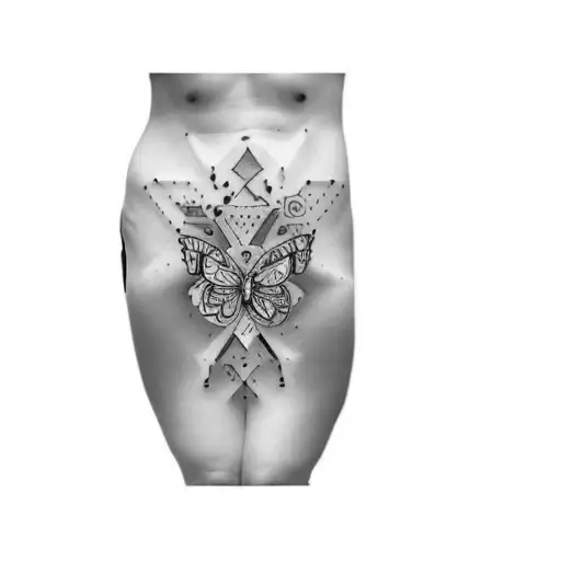 a butterfly on a woman's stomach tattoo design idea
