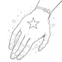 a small star on the wrist with sparkles tattoo design idea