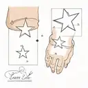 a small star on the wrist with sparkles tattoo design idea