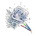 paint brushes and pencils with little flowers or tied up with plants tattoo design idea