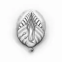 A lifelike seashell with 'Amanda' written inside, as a symbol of her love for the beach tattoo design idea