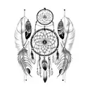 A dreamcatcher with intricate dotwork detailing and crow feathers intertwined tattoo design idea