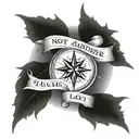 wind rose with the words "not all that wander are lost" written across the circle tattoo design idea
