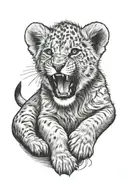 Lion cub howling tattoo design idea