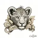 lion cub face with name written on the side "Camila" tattoo design idea