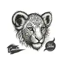 lion cub face with name written on the side "Camila" tattoo design idea