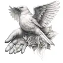 une colombes dans des mains avec des rose dans le bec  tattoo design idea