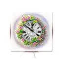 A realistic clock with Roman numerals surrounded by a vibrant rose garden tattoo design idea