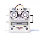 The wooden puppet is controlled by tapes of two audio cassettes that are placed above it tattoo design idea