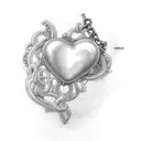 heart shaped box from side with chain around it tattoo design idea