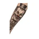 a tattoo of a clown tattoo design idea